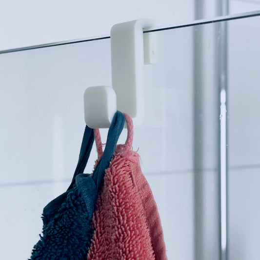 Bathroom towel hanger for glass wall