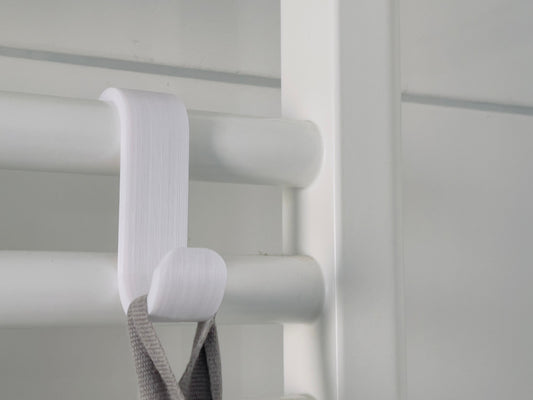 Towel hanger for bathroom radiator