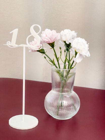 Table stands with numbers for wedding table